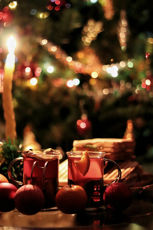 a table topped with two mugs filled with liquid