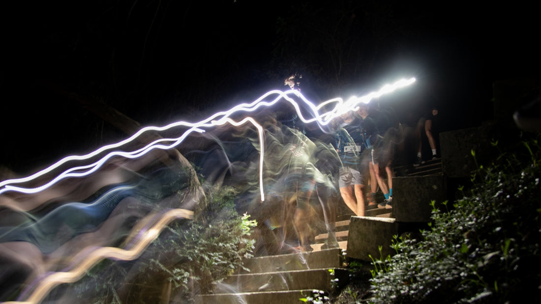 A blurry photo of a staircase at night
