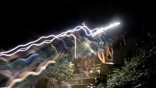 A blurry photo of a staircase at night